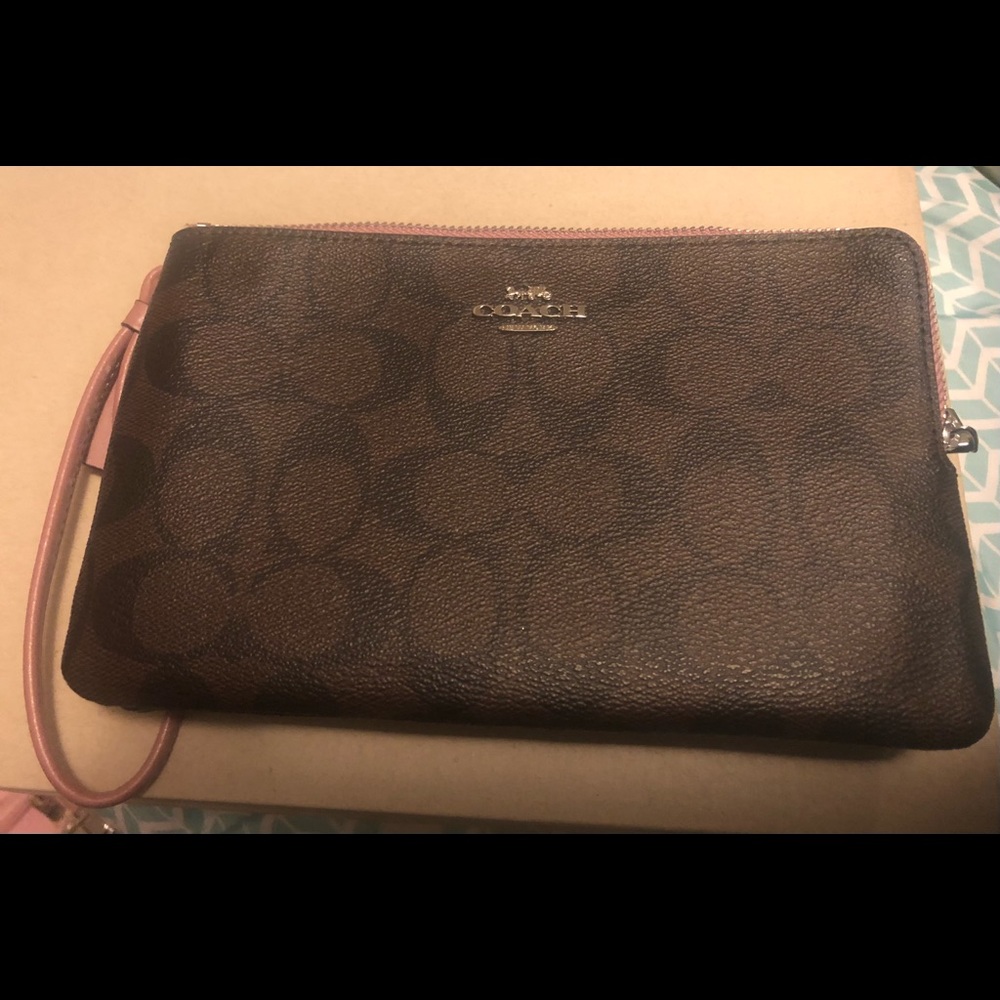 Coach wristlet with pink interior - great condition NWOT
